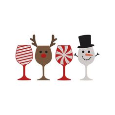 three wine glasses with different designs on the bottom and one has a snowman in top hat