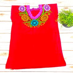 Unique Handmade Embroidered Blouse. Beautiful Color And Very Comfortable. Fast Shipping Red Tops With Floral Embroidery For Festivals, Red Short Sleeve Blouse With Embroidered Neckline, Red Floral Embroidered Blouse For Summer, Traditional Red Tops With Embroidered Neckline, Red Embroidered Festival Tops, Red Folk Style Tops For Festive Occasion, Red Floral Embroidered Top For Festival, Red Blouse With Embroidered Neckline For Summer, Traditional Red Top With Embroidered Neckline