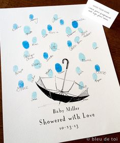 a baby shower with love written on it and an umbrella