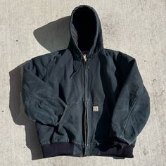 - Lightly Distressed, Still Has Tons Of Wears Left In It And Is An Extremely Durable Material (Carhartt Cmon Now You Knew That) - Tagged Xl - Light Color Fading Provides Good Color Break Between The Bottom Sleeves And Bottom Jacket - Inside Of The Jacket Is Fleece Lined, Will Keep You Warm When It’s Cold But You Aren’t Gonna Bake In It If It’s Not - Has Two Inner Pockets, And All Zippers Are Original And Working #Carhartt #Jacket #Detroit #Vintage Detroit Carhartt Jacket, Cathartic Jacket, Carhartt Mens Fashion, Black Carhartt Jacket, Texas Outfits, Carhartt Active Jacket, Black Winter Jacket