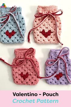 four crocheted bags with hearts on them