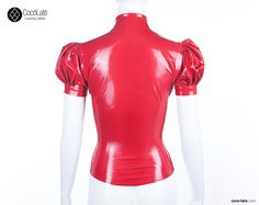 Eye catching latex blouse, it has fitted puffed sleeves, round collar and front popper fastening. Available in your choice of a variety of colors. Shown in plain red. If you choose made to measure option we will contact you, so you can provide your measurements. If you would like to order a standard size just specify size upon purchase. This item is made to order, if you need garments for specific time please, contact. Fitted Puff Sleeve Top With Elastic Shoulders, Fitted Puff Sleeve Top For Party, Fitted Tops With Gathered Sleeves For Parties, Fitted Solid Color Top With Stand Collar, Fitted Solid Tops With Stand Collar, Fitted Balloon Sleeve Puff Sleeve Top, Fitted Puff Sleeve Top With Balloon Sleeves, Fitted Short Sleeve Blouse With Elastic Sleeves, Fitted Blouse With Elastic Short Sleeves