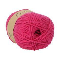 a ball of pink yarn on a white background