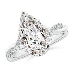 an oval cut diamond ring with pave set shoulders