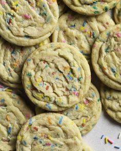 a pile of cookies with sprinkles on them