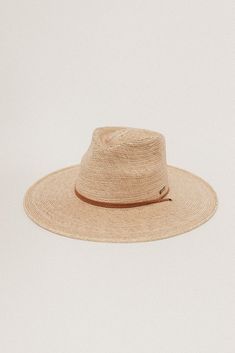 DESCRIPTION Crafted with exotic Guatemalan Palm Straw and hand shaped in Texas, USA, the Monterrico is a sturdy, toasted colored straw hat shaped into a teardrop fedora crown and wide, flat brim that offers amazing sun protection. Trimmed with a brown, genuine leather chinstrap and leather slider, the Monterrico is the perfect summer companion, and is built to stick with you for years to come. UPF Rating: 50 + (Excellent) HAT SIZE CHART Available in 55 S, 57 M, 59 L, 61 XL and 63 XXL. Due to the Mens Sun Hats, Hat Size Chart, Texas Usa, Hand Shapes, Sun Hat, Straw Hat, Hat Sizes, Easy Wear, Perfect Summer