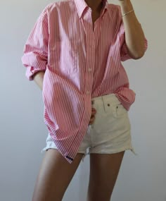 Great button down in overall good condition with a couple of tiny sports (please look at all photos)  Perfect for beach, city strolls, or just to throw on and wear in the house lounging around. Boyfriend shirt listed as size XL but can fit various sizes, please check with the measurements below. Pictured on 5.7 117 lb size 2 body. Pit to pit - 24 Shoulders - 20 Total length- 32 Please message me with any additional questions. Thank you all sales are final Pink Button Up Shirt Outfit, Pink Striped Shirt Outfit, Oversized Button Down Shirt Outfit, Button Shirt Outfit, Checked Shirt Outfit, Pink Striped Shirt, White Shirt Outfits, Oversized Button Down Shirt, Beach City