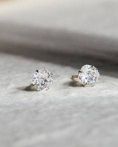 These cushion studs are set on their long faces to show the full diamond's beauty and give it that perfect edge. Find the perfect pair of certified lab grown or natural diamonds with our curated diamond search. Delivery: Please allow up to 1-2 weeks for delivery. For rush orders please contact our Concierge. Gold Cushions, Long Faces, Shopping Event, Fine Jewelry Designers, Rose Gold Diamonds, Gold Platinum, Diamond Gemstone, High Cut, Diamond Shapes