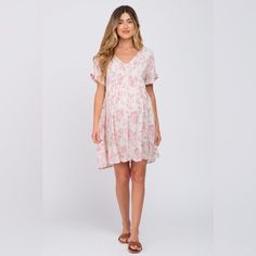 A Floral Print Maternity Dress Featuring A V-Neckline, Short Dolman Sleeves, And An Empire Waist. First Love By Pinkblush New Without Tags Inventory #P6931 Pink Floral Print V-neck Dress For Summer, Pink Floral Print V-neck Mini Dress, Feminine V-neck Dress For Daywear, Feminine Floral V-neck Dress For Day Out, Summer Floral Print V-neck Dress For Daywear, Pink Feminine V-neck Dress For Vacation, Feminine Pink V-neck Dress For Vacation, Flowy Floral Print V-neck Dress For Day Out, Feminine V-neck Mini Dress For Daywear