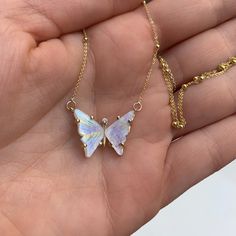 This handmade, butterfly necklace symbolizes your rebirth and the next chapter in your story. It's time to start something new and trust the magic of new beginnings. Embrace the beauty of your own transformation and let go of the past. DETAILS - One-of-a-kind butterfly - Crafted with 14k yellow solid gold - Natural, genuine moonstone - Diamond - Chain style may vary slightly - Handmade in New York In natural stones, color variations and natural imperfections are common and make each stone rare and uniquely beautiful. VARIATIONS If you require any variation of this style (different chain, shorter chain length, etc) feel free to message us. We will do our best to accommodate you. Additional costs may apply depending on the variation. MADE TO ORDER This item is made to order. Made to order it Butterfly Charm Necklace, Pretty Jewelry Necklaces, Butterfly Crafts, Diamond Chain, Fancy Jewelry, Butterfly Necklace, Jewelry Lookbook, Opal Necklace, Girly Jewelry