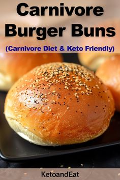 a close up of a bun on a plate with the words carnivore burgers