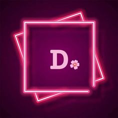 the letter d is illuminated in pink neon lights and has a flower on it's side