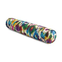 a multicolored umbrella cover is shown on a white background and it's rolled up