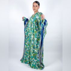 New Without Tags Handmade Green Multicolor Floral Print Oversized Batwing Sleeve Kaftans One Size Fits Most Polyester Handmade Green V-neck Free Size Kimono, Green Floral Print Maxi Kaftan, Green Free Size Kimono With Kimono Sleeves, Green Kimono With Kimono Sleeves, Green Flowy V-neck Kimono, Green V-neck Kimono For Vacation, Casual Silk Kaftan For The Beach, Green Bohemian Kaftan With Floral Print, Green Long Printed Kaftan