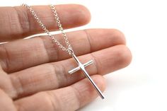 Simple cross pendant necklace. Handmade with thick wire (1.6mm) sterling silver. The cross measured 33mm (1 3/8 inch) x 20mm (3/4 inch), polished to bright shine and set on sturdy sterling silver chain. I can cut the chain at any size you prefer. Great gift for holiday, appropriate for all ages. Minimalist Nickel-free Cross Necklace, Simple Sterling Silver Cross Pendant Necklace, Silver Crucifix Cross Necklace For Everyday, Minimalist Silver Cross Necklace For Gift, Minimalist Sterling Silver Cross Pendant Necklace, Minimalist Silver Cross Necklace Gift, Minimalist Sterling Silver Pendant Cross Necklace, Everyday Sterling Silver Crucifix Necklace, Minimalist Silver Cross Necklace