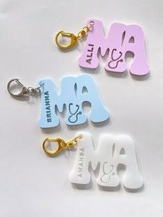 Medical Assistant keychain, MA keychain, personalized Medical Assistant gift, customized MA gift, gift for MA, gift for Medical Assistant, new medical assistant, MA grad gift, personalized MA accessory, custom MA accessory, keychain, custom keychain, MA, Medical Assistant, personalized keychain, Bag Tag, Backpack Tag, Lunch Box Tag Loud and proud to be a Medical Assistant / MA!  The stylish, retro MA keychain is perfect for that overworked medical care worker in your life!  The "MA" measures 2.5 inches wide and hangs from a golden or a silver chain that swivels and makes it easy to add to any set of keys, a backpack, purse or even a gift bag! It makes a fabulous gift too for a Medical Assistant grad! Don't forget to pick the color for the "MA" before and typing in the name you want on the Customizable White Keychains For Personalized Gifts, Personalized White Keychain For School, Customized White Keychains For Personalized Gift, White Custom Name Keychains For Personalized Gift, White Custom Name Keychain For Personalized Gift, Personalized White Keychain With Custom Name, Personalized White Custom Name Keychain, Customizable Rectangular Keychains For Personalized Gifts, Customizable Blue Keychains For Personal Use