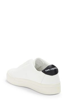 A stretchy-gore panel makes this colorblock sneaker easy to slip in and out of, while a tiny Karl pin punctuates the leather for a touch of attitude. Leather, textile, rubber and metal upper/synthetic lining/rubber sole Imported White Synthetic Slip-ons With Perforated Toe Box, Sporty Leather Slip-ons With Vulcanized Sole, White Leather Slip-on Sneakers For Sports, Streetwear Sneakers With Contrast Sole And Slip-on Design, White Low-top Slip-ons For Sports, Sporty Slip-ons With Rubber Sole For Streetwear, Synthetic Low-top Slip-ons For Sports, Low-top Slip-ons With Contrast Sole For Streetwear, Sporty Leather Slip-ons For Streetwear