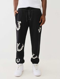 BIG T WARPED PUFF PRINT LOGO JOGGER Trendy Streetwear Sweatpants With Ribbed Cuffs, Trendy Sweatpants With Ribbed Cuffs For Streetwear, Relaxed Fit Logo Print Sweatpants For Athleisure, Athleisure Joggers With Logo Print In Relaxed Fit, Relaxed Fit Athleisure Sweatpants With Logo Print, Athleisure Relaxed Fit Joggers With Logo Print, Relaxed Fit Athleisure Joggers With Logo Print, Casual Jogging Bottoms With Logo Print, Hip Hop Style Relaxed Fit Joggers For Loungewear