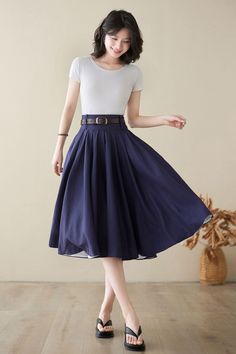 "Comfortable, gathered, a-line, knee-length skirt with high waistband. And it has pockets! This linen skirt will makes you a feminine and effortless look when paired with a tee or tank, and any of your well-loved heels, sneakers, clogs, flats, or sandals. On a breezy day, the wind sways your skirt like a sail. DETAIL * 100% linen * Right hidden zipper closure * Two side pockets * with belt loops * High waist skirt * Pleated skirt * Knee length * Perfect for spring, summer, autumn * Wash by hand Navy Circle Skirt Outfit, Femme Summer Outfits, Knee Length Skirt Outfit, Skirt Outfits Spring, Knee High Skirt, Modesty Clothing, Saber Cosplay, Spring Skirt Outfits, Denim Skirts Knee Length