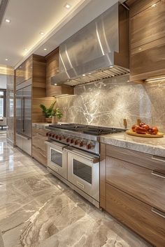 a kitchen with marble counter tops and stainless steel appliances, along with wooden cabinetry