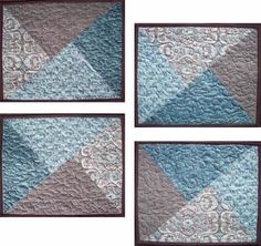 four pieces of blue and gray quilted wall hangings