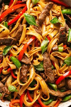 stir fry with beef, peppers and noodles