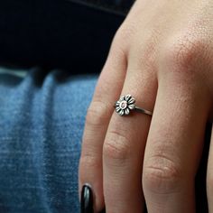 Little Daisy Ring, Sterling Flower Ring, Boho Flower Ring, Bridesmaid Ring, Antiqued Ring, Silver Daisy Ring, Mothers Day Ring What a sweet little sterling silver daisy ring to wear through the seasons! New to LGR and so unique and fun that its sure to draw lots of attention for sure! A beautiful gift of love for mom, bridesmaids, sisters, and besties too! Great gifts for any and all occasions when a smile on her face is required. ✦This listing is for the (sterling silver daisy ring with the cop Adjustable Flower Rings For Anniversary, Adjustable Flower Shaped Anniversary Rings, Adjustable Delicate Flower Promise Ring, Hypoallergenic Round Flower Ring For Wedding, Hypoallergenic Flower Ring For Wedding, Dainty Adjustable Stackable Flower Ring, Dainty Flower Ring With Flower Charm, Dainty Stackable Toe Flower Ring, Sunflower Design Rings As Gifts