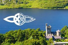 an aerial view of a castle, lake and mountains with the word celtic on it