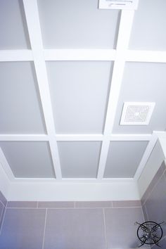 the ceiling in this bathroom is painted white