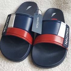 New Pair Of Men's Nautica Sludes In Red, White, And Blue Color Block, Velcro Closure On Top To Adjust Fit. Size 10 Casual Synthetic Sandals For Water Sports, Casual Waterproof Sport Sandals For Water Sports, Waterproof Casual Sport Sandals For Water Sports, Casual Waterproof Sandals For Water Sports, Casual Slide Sandals For Water Sports, Casual Open Toe Flip Flops For Water Sports, Casual Slip-on Sport Sandals For Water Sports, Blue Sport Sandals For Water Sports In Summer, Casual Synthetic Slides For Water Sports