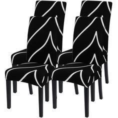 a set of four black chairs with white lines on the upholstered backrests