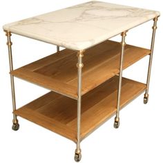 a marble topped table with three shelves on each side and two wooden trays underneath it