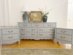 the dressers are painted gray and gold