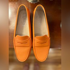 Tod’s Loafers, Orange Leather, Size 41, In Box With Duster Bag. Never Worn Orange Loafers With Round Toe For Spring, Orange Round Toe Loafers For Spring, Spring Orange Loafers With Round Toe, Orange Loafers With Leather Sole For Formal Wear, Spring Orange Round Toe Loafers, Classic Orange Loafers With Leather Sole, Orange Leather Loafers With Rubber Sole, Elegant Orange Loafers With Leather Sole, Classic Orange Leather Loafers