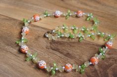 Estate Vintage Jewelry Necklace Beaded , Faux Pearls  White  Green Orange Flower  Leaf C-034 Retro Orange Necklace Gift, Retro Green Beaded Necklace For Gift, Handmade Retro Green Beaded Necklace, Vintage Orange Necklace With Colorful Beads, Vintage Flower Shaped Beaded Necklaces, Vintage Flower-shaped Beaded Necklaces, Vintage Flower Beaded Necklaces, Retro Green Beaded Necklaces, Vintage Handmade Orange Necklace