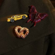 Introducing our deliciously charming Pretzel Brooch! Pin it to your favorite jacket, bag, or scarf! Perfect for our fashion-forward customers who love this iconic NYC snack. Embroidered Brooch, Mignonne Gavigan, Scarf Necklace, Embroidered Butterfly, Pre Fall Collection, Virtual Fashion, Fabric Beads, Butterfly Brooch, Earring Sale