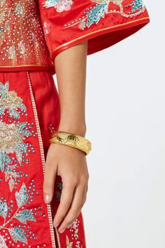 Adorn those plain wrists with a bit of gold to help complete your cheongsam look! Easy to put on and remove, this bangle also pairs nicely with our Phoebe dress. *These bangles run a bit smaller (21cm circumference). Please check your wrist measurements.* Festive Bangle Cuff Bracelet, Ceremonial Cuff Bracelet For Festivals, Ceremonial Festival Cuff Bracelet, Festive Ceremonial Bangle, Festivals Gold Bangle Bracelet, Festival Gold Bangle Bracelet, Traditional Cuff Bangle For Wedding, Elegant Ceremonial Cuff Bangle, Traditional Yellow Gold Bracelets For Party