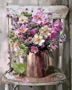 a painting of flowers in a vase on a chair