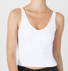 Fabric: 92% Nylon / 8% SpandexSeamless wide ribbed tank top with a v neckline. Seamless V-neck Top For Summer, Stretch Ribbed V-neck Tank Top, Fitted Ribbed V-neck Tank Top, White Seamless V-neck Top, Seamless Stretch V-neck Knit Top, Stretch Ribbed Knit Top With V-neck, Seamless V-neck Tank Top, Casual V-neck Tank Top With Seamless Construction, Seamless V-neck Knit Top