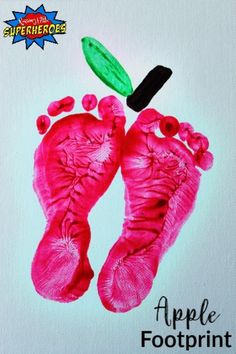 a drawing of two baby feet and a green leaf