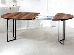 two tables made out of wood and metal