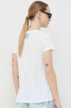 This PATRIZIA PEPE pure cotton jersey T-shirt is customized at the front. Round neckline, slim fit and short sleeves. 100% Organic Cotton Regular length Short sleeve round neckline Style Nr. 2M4317 J127 J3R2 Short Sleeve Cotton Jersey Top With Logo Print, Cotton Jersey Logo Print Short Sleeve Tops, Cotton Jersey Short Sleeve Top With Logo Print, White Jersey T-shirt For Summer, White Short Sleeve Jersey Top, White Graphic Tee In Jersey Material, White Graphic Tee Jersey T-shirt, Sporty Scoop Neck Top With Graphic Print, Summer White Jersey T-shirt