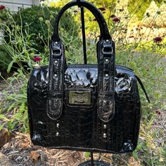 I Purchased This Bag Years Ago And It Has Been In My Closet Safe In The Dust Bag. My Home Is Nonsmoking And Pet Free. I Never Used It As I Never Had Just The Right Occasion. There Are A Few Teeny Tiny Marks On Metal Maxx Plate On Front Of Bag (See Pics). This Bag Is Stunning! Price Is For New Without Tags Bag And Original Dust Cover. It Is A Maxx New York Signature Croco Embossed Leather Bag In Black. Measurements Are Approximate... Height (Without Handles)- 9" Width- 10 1/2" Depth- 4 1/2 " Hand Faux Leather Satchel With Silver-tone Hardware, Luxury Black Faux Leather Satchel, Black Faux Leather Bag With Silver-tone Hardware, Black Trendy Satchel With Silver-tone Hardware, Black Satchel With Silver-tone Hardware And Double Handle, Black Satchel With Silver-tone Hardware For Shopping, Closet Safe, Dust Cover, Embossed Leather