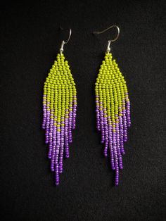 Purple Tassel Drop Earrings With Dangling Beads, Purple Beaded Earrings With Tassels For Gift, Summer Purple Earrings With Colorful Beads, Handmade Purple Tassel Earrings, Handmade Purple Tassel Earrings With Round Beads, Purple Beaded Dangle Tassel Earrings, Purple Beaded Tassel Earrings Gift, Purple Earrings With Beaded Fringe, Handmade Purple Dangle Tassel Earrings