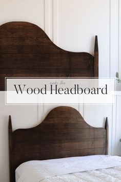 a wooden headboard with the words wood headboard above it on top of a bed