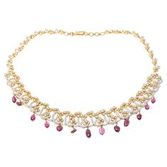 This 18K yellow gold necklace presents a dynamic design with and opulent frosting of round faceted diamonds. Suspended from the necklace are a fringe of pink tourmaline beads, adding a colorful touch to the piece. Diamonds are approximately 8.0 TCW. Hook style clasp Marks: Unmarked, Tested as 18K Dimensions: 16" L x 1" W Weight: 45.1 Gross dwt Pink Diamond Necklace 1stdibs, Vintage Choker Necklace, Vintage Choker, Yellow Gold Necklace, Fringe Necklace, Tourmaline Beads, Dynamic Design, Lorde, Pink Tourmaline