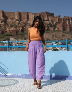 "Custom made baggy pants for women, Lilac linen pant, Bohemian pants, Made to order, Plus size Perfect for summer days.. goes well with cropped top.. Comfy baggy pants.. -Model height: 5'3\" wearing size S -Length: 36\" -Fit: Comfortable -Closure: Elasticated waist You can style these linen pants with casual tops or our tank tops. You would want to wear these everyday!" Purple Linen Pants Outfit, Baggy Linen Pants Outfit, Lilac Pants Outfit, Purple Shorts Outfit, Purple Pants Outfit, Linen Pants Outfit Summer, Trousers Outfit Casual, Baggy Pants For Women, Sisterhood Round