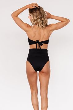 Baltic Born exclusive style Pairs with our Milos High Waist Bikini Bottom in Black Classic black color Tie back bandeau style bikini top Removable padded cups Adjustable to fit most body types 80% Nylon, 20% Spandex Hand wash cold, lay flat to dry Trina is 5'6, cup size 32D, size 2 and is wearing size S Victoria is 5'7, cup size 34D, size 8/10 and wearing size L Sierra is 5’8, cup size 37”, size 6/8 and wearing size L Bandeau Swimwear With Built-in Bra For Sunbathing, Bandeau Swimwear With Removable Bra Pads For Sunbathing, Bandeau Swimwear With Padded Cups For Poolside, Bandeau Swimwear With Removable Bra Pads For Poolside, Bandeau Swimwear With Built-in Bra For Pool, Black High Waist Swimwear With Built-in Bra, High Waist Black Swimwear With Built-in Bra, Black High-waist Swimwear With Built-in Bra, Stretch Strapless Swimwear Bra Friendly