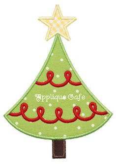 an applique christmas tree with the words applique cafe on it's side