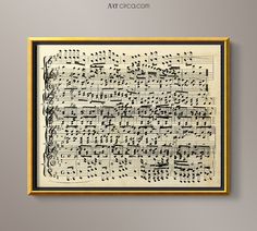 an old sheet music manuscript is hanging on the wall